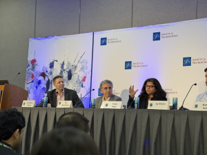 IMG_6748-2.png Trisha Kesar answers a question during the SfN press conference on AI in neuroscience, moderated by Chris Rozell.