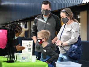 Family learning at demo booth